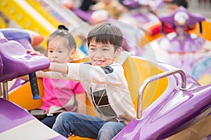 Kids playing in amusement fun park