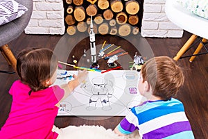 Kids playing in astronauts at home