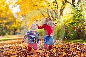 Kids playing in autumn park