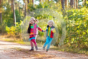 Kids playing in autumn park