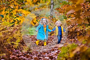 Kids playing in autumn park