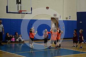 Kids playing basketball