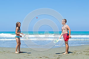 Kids playing beach ball