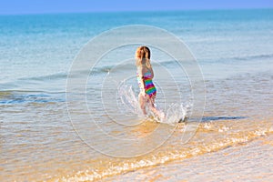 Kids playing on beach. Children play at sea