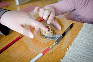 Kids playing with big snail