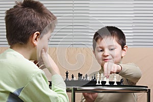 Kids playing chess