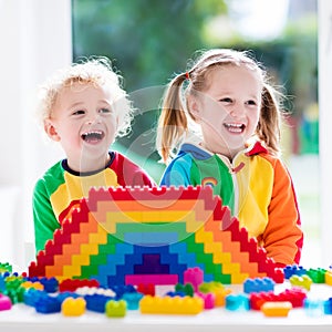 Kids playing with colorful blocks