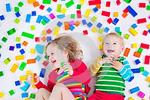 Kids playing with colorful blocks