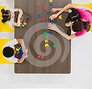 Kids playing colorful toys