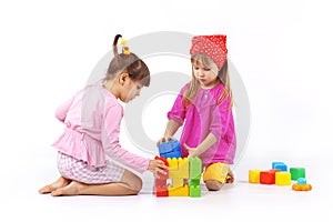 Kids playing with constructor photo