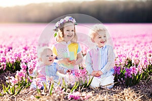 Kids playing in flower field