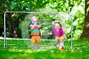 Kids playing football in school yard