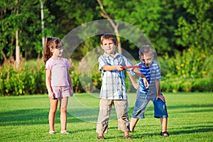 Kids playing freesbee photo