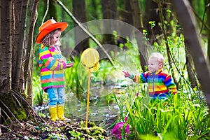 Kids playing with frog