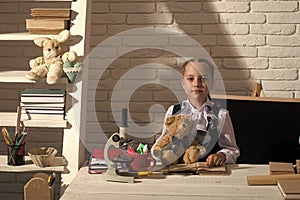 Kids playing - happy game. Back to school and childhood concept. Schoolgirl with proud face