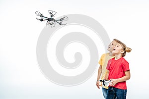 Kids playing with hexacopter drone photo