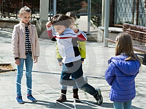 Kids playing in jump rope game