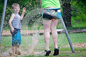 Kids Playing In Mud