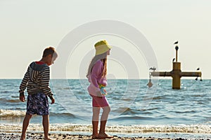 Kids playing outdoor on beach.