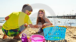 Kids playing outdoor on beach.