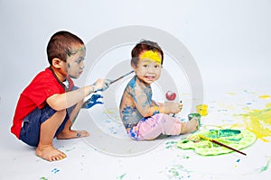 Kids playing with paint