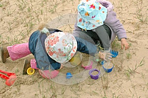 Kids playing with sand
