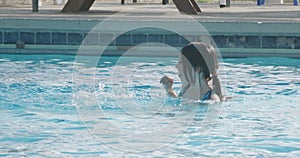 Kids playing in a swimming pool