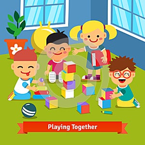 Kids playing together in kindergarten room