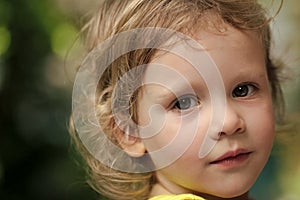 Kids playing with toys. Baby girl with green eyes on cute face