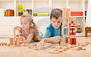 Kids playing with wooden blocks