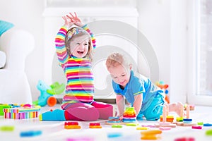 Kids playing with wooden blocks