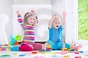 Kids playing with wooden blocks