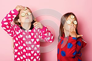 Kids pose on pink background. Children with proud faces