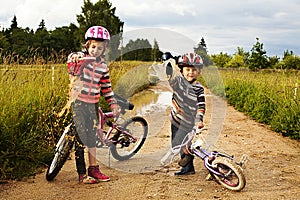 Kids pour out water from shoes