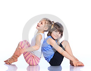 Kids practice yoga