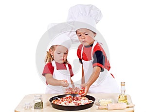 Kids preparing pizza photo
