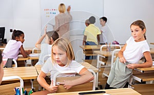 Kids pupils talking during recess between lessons