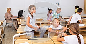 Kids pupils talking during recess between lessons