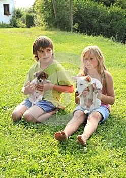 Kids with puppies