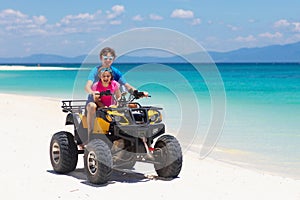 Kids on quad bike. Off road all terrain vehicle