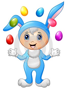 Kids in rabbit costume with easter eggs flying