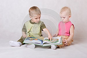 Kids read the book photo