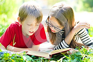 Kids reading a book