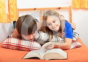 Kids reading a book