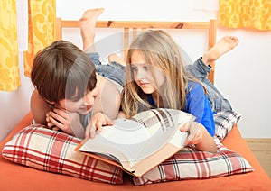 Kids reading a book