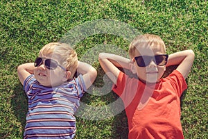 Kids relaxing on the grass