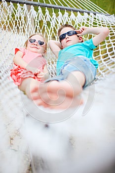 Kids relaxing in hammock