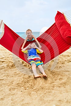 Kids relaxing in hammock