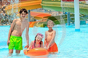 Kids in resort swimming pool