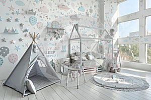 Kids room with light interior design in apartment photo